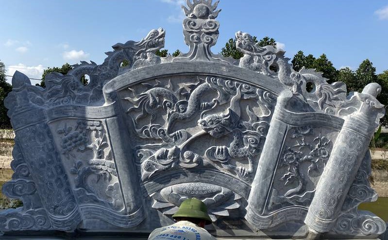 Lưỡng long thư hùng - hình ảnh rồng thiêng hình 2 Cuốn thư đá mang hoa văn lưỡng long thư hùng